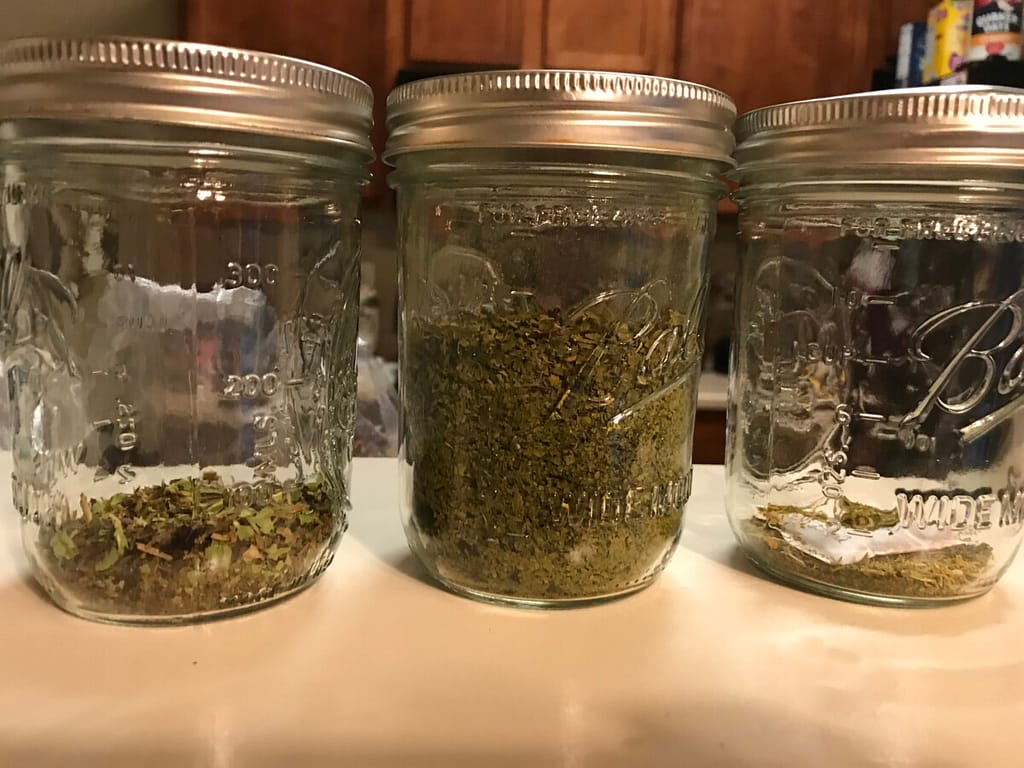 3 jars containing dried lettuce, kale & nasturtium