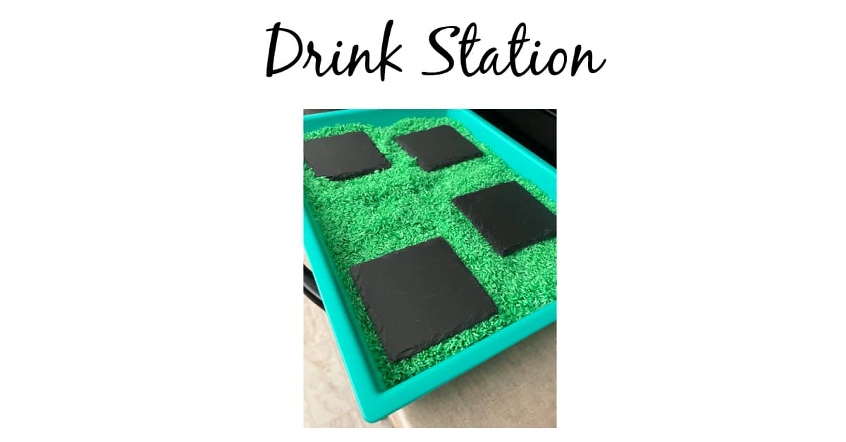 Your guests will love this unique garden party drink station. Using rice and coasters to make a path of drinks in the garden space.