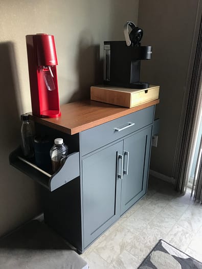 A new kitchen island sits in a corner of the dining room