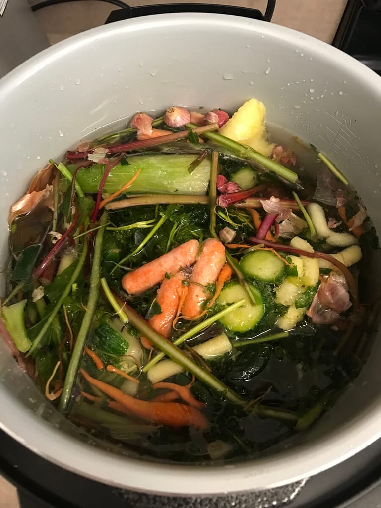 Pot of scrap vegetables getting ready to be turned into scrap vegetable broth